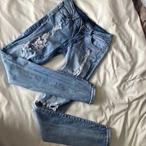 Women light mid rise denim ripped jean